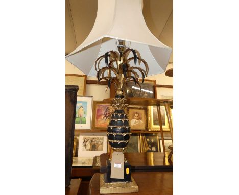 A contemporary black painted and gilt decorated pineapple lamp, with hexagonal silk shade, height (excluding fittings) 70cm