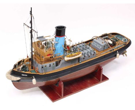 A Caldercraft 1/32 scale kit built model of an Imara twin screw harbour tug boat, comprising of red and black hull with grey 