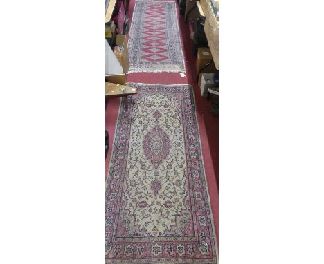 A Persian woollen red ground Bokhara hall runner (with wear to surface), 230 x 72cm; together with a Persian woollen cream gr