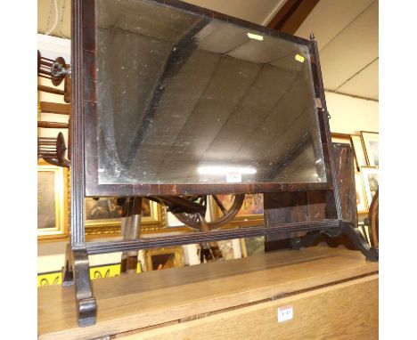 A 19th century mahogany swing toilet mirror, together with a further similar oval example (2)