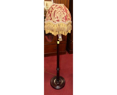 A reproduction mahogany standard lamp, with shade, overall h.156cm 