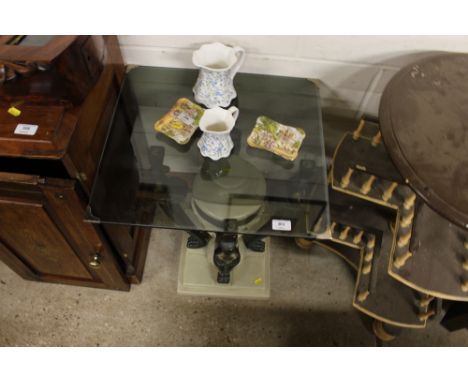 A decorative glass metal and faux marble lamp table  