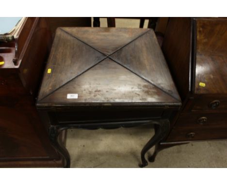 A late Victorian mahogany envelope card table 