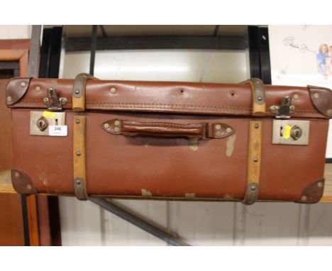 A vintage wooden bound suitcase 