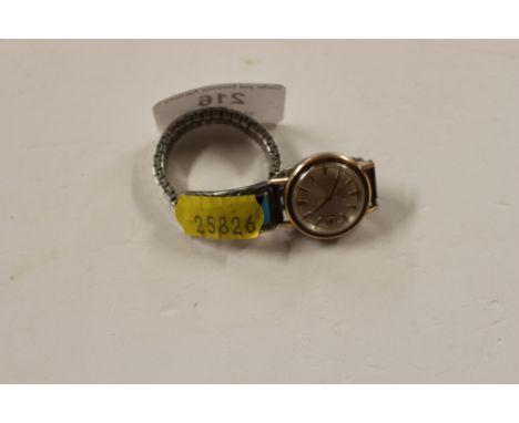 An Eterna-Matic wrist watch with enamel decorated strap 