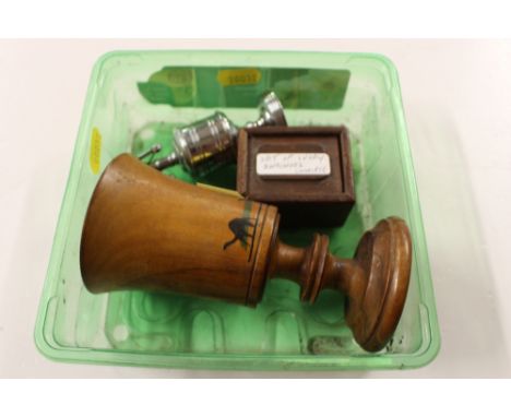 A cased set of miniature ivory and ebony dominoes; a chrome pedestal table lighter; and an olive wood Jerusalem beaker