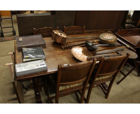 An oak refectory type dining table; and four chairs with linen fold panel backs 