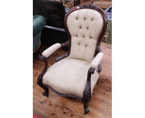 Victorian mahogany open armchair in light buttoned fabric.