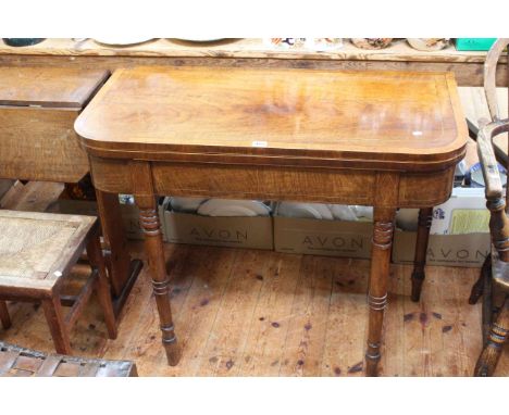 19th Century mahogany crossbanded and line inlaid fold top card table on turned legs, 91cm by 75cm (closed).