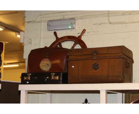 Ships wheel, two briefcases, tin trunk, assorted prints, brass fender, stick stand and various sticks and shooting sticks.