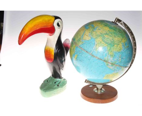 Terrestial globe and a Toucan ornament 41cm.