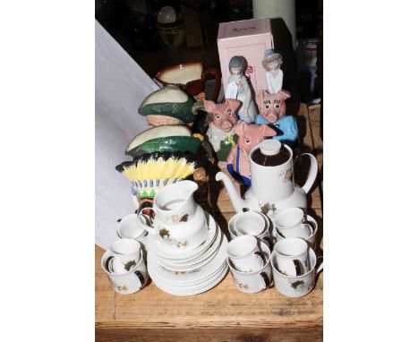 Four Royal Doulton character jugs, three Wade Nat West piggy banks, Royal Doulton 'Westwood' coffee service and two Nao figur