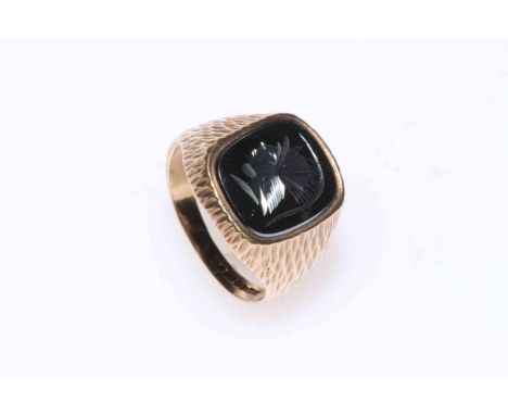 9 carat gold ring with haematite intaglio, size R.