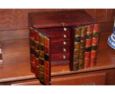 Five drawer specimen chest in a form of a book shelf, 30cm by 24cm.