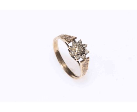 9 carat gold and diamond set flower ring, size R.