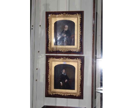 Pair Victorian portrait images in delicate fancy gilt frames and glazed mahogany outer cases, overall 51cm by 46cm.