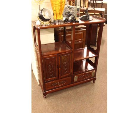 Oriental hardwood two drawer shelf unit 99cm by 112cm and an Oriental four door sideboard, 183cm by 90cm.