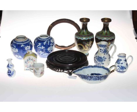 Collection of Chinese pieces comprising two prunus ginger jars, blue and white sauce boat, two jugs and vase, polychrome tea 