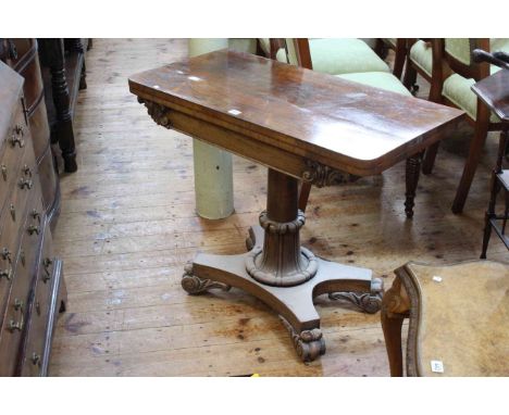 19th Century rosewood fold top card table on turned pedestal to quadriform base, 91.5cm by 73cm (closed).