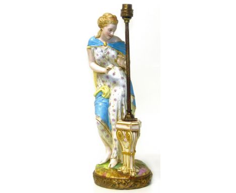 Mid 19th century Continental porcelain table lamp modelled as a lady stood by a pedestal Condition reports are not available 