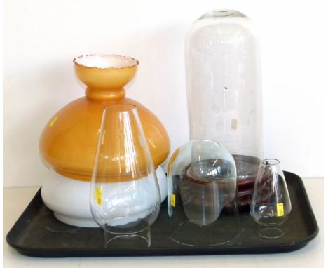 Victorian glass dome on Chinese hardwood base, also another dome, two shades and two oil lamp funnels Condition reports are n