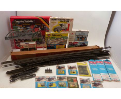 Airfix signal, girder bridge, Lima trackside building, quantity Peco track, eight Merit railway accessories, Hornby operating