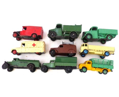 Dinky toys green petrol tanker, similar wagon, Daimler ambulance, flat-bed lorry, brown loud speaker van, Royal Mail van, Dod