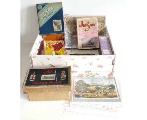 A box of 10 vintage jigsawz including two Cunard, 2 x Chad Valley, 2 x GWR, four railway puzzles etc Condition reports are no