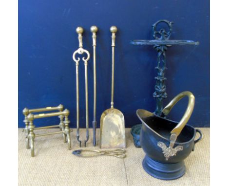 A set of brass fire irons, coal bucket and cast iron two division stick stand Condition reports are not available for the Int