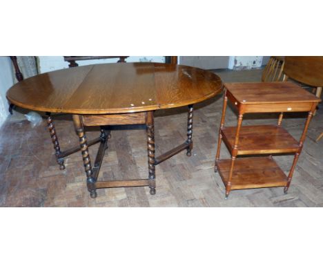 Early 20th century oak barley-twist gate-leg table and three tier what-not. Condition reports are not available for the Inter