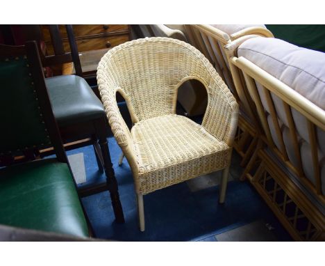 A Wall Mounting CD Storage Rack, 22cm Wide Together with a Wicker Armchair 