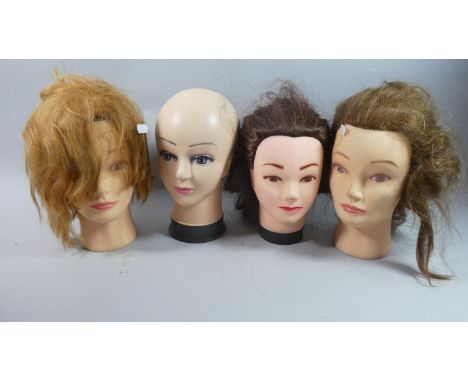 Four Late 20th Century Plastic Mannequin Heads 