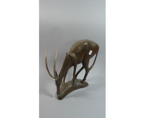 A Carved African Study of an Oryx, Formerly Table Lamp Base, 31cm Long 