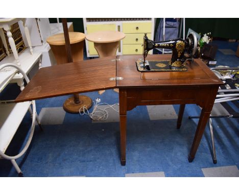 A Jones Manual Sewing Machine on Table 