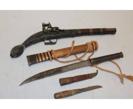 A Burmese short sword in bound wooden scabbard, reproduction flintlock pistol and a Swedish knife (3)