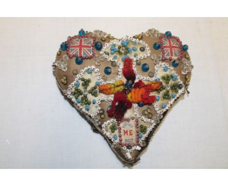 A First War soldier's valentine heart pincushion decorated with beads and Union Jack panels