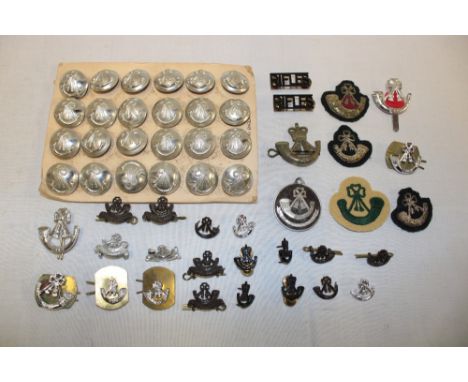 A selection of Light Infantry badges and insignia together with anodised buttons etc.