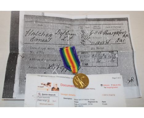 A First War Victory medal awarded to No. 24764 Pte. E. Hatcher DCLI