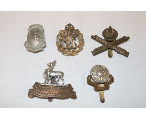 Five various First War military cap badges including 1st Birmingham Battalion Royal Warwickshire Regiment; Kent Volunteer Fen