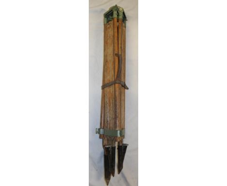 A Mine Surveyor's stained wood and painted metal folding adjustable tripod with leather straps (ex-Camborne School of Mines)