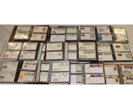A large and comprehensive collection of GB first day covers in fourteen folder albums, 1960's onwards including some presenta
