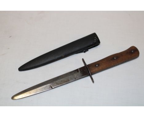 A Second War German Luftwaffe boot knife stamped "Waffenamt No. 5" in steel scabbard