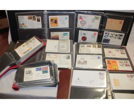 Eight folder albums containing a large selection of mixed GB and Foreign first day covers, mainly 1970's/80's