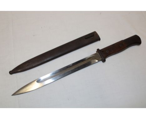 A Second War German K98 Mauser bayonet with single edged blade by Walter & Co/F Herder & Son Solingen in steel scabbard