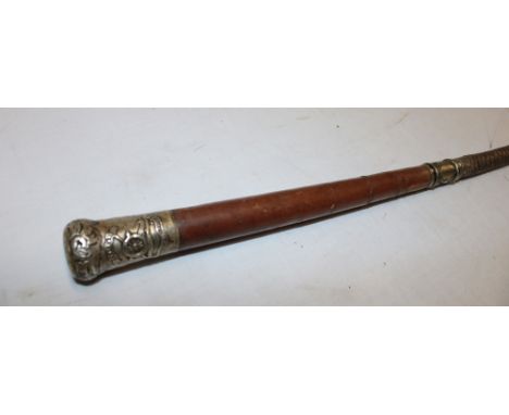 A First War Royal Artillery field gun driver's riding crop with plaited leather stem and nickel mounted top bearing the Royal