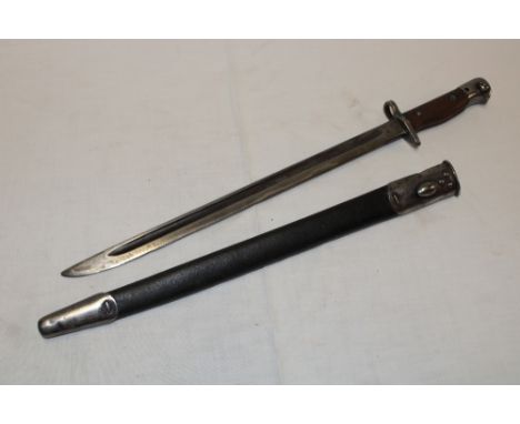 A 1907 pattern Lee Enfield bayonet by Wilkinson in steel mounted leather scabbard