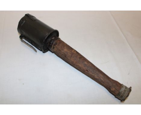 A First War Inert German M16 stick grenade with wooden handle