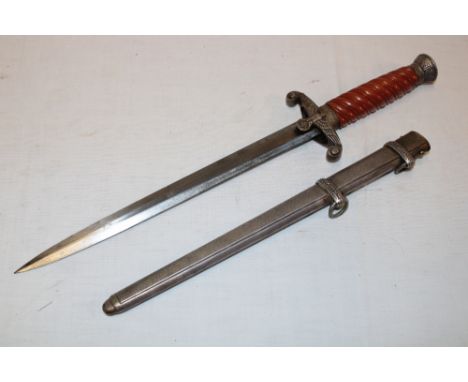 A Second War German Nazi Army Officer's dagger with double-edged steel blade by E. Pack of Solingen, brown traditional grip i