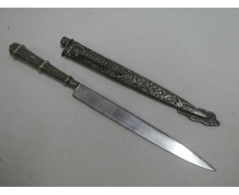 An unusual South American horseman's knife with 8" single edged blade, silvered hilt in matching silvered scabbard with horse