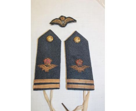 A pair of Royal Air Force embroidered King's Crown epaulettes by Gieves Limited together with similar embroidered R.A.F. wing